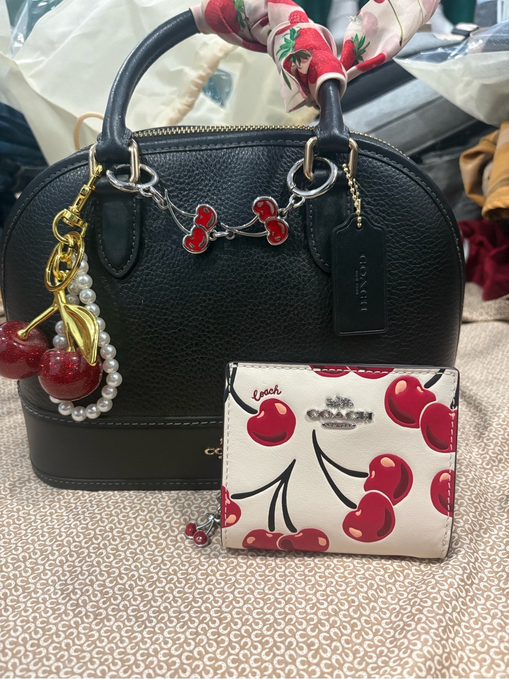 Coach Black Pebbled Leather Satchel with Red Cherry Charms